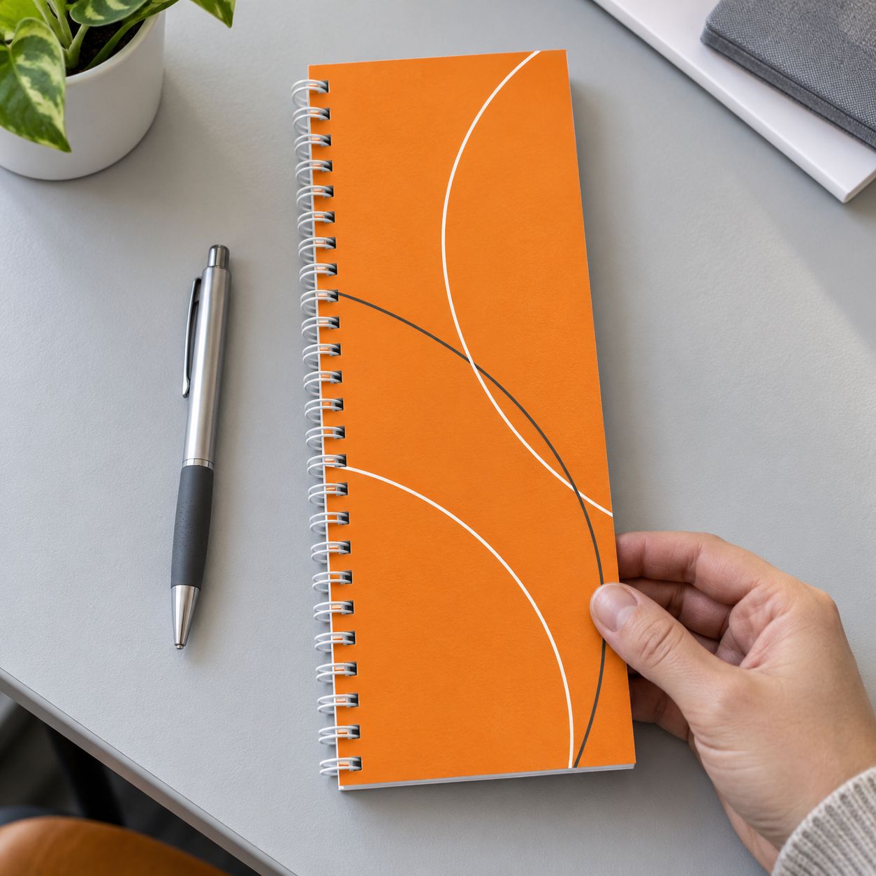 1/3 A4 Wire-Bound Booklet 1/3 A4 Wire-Bound Booklet with white wire binding, 40 sheets / 80 pages