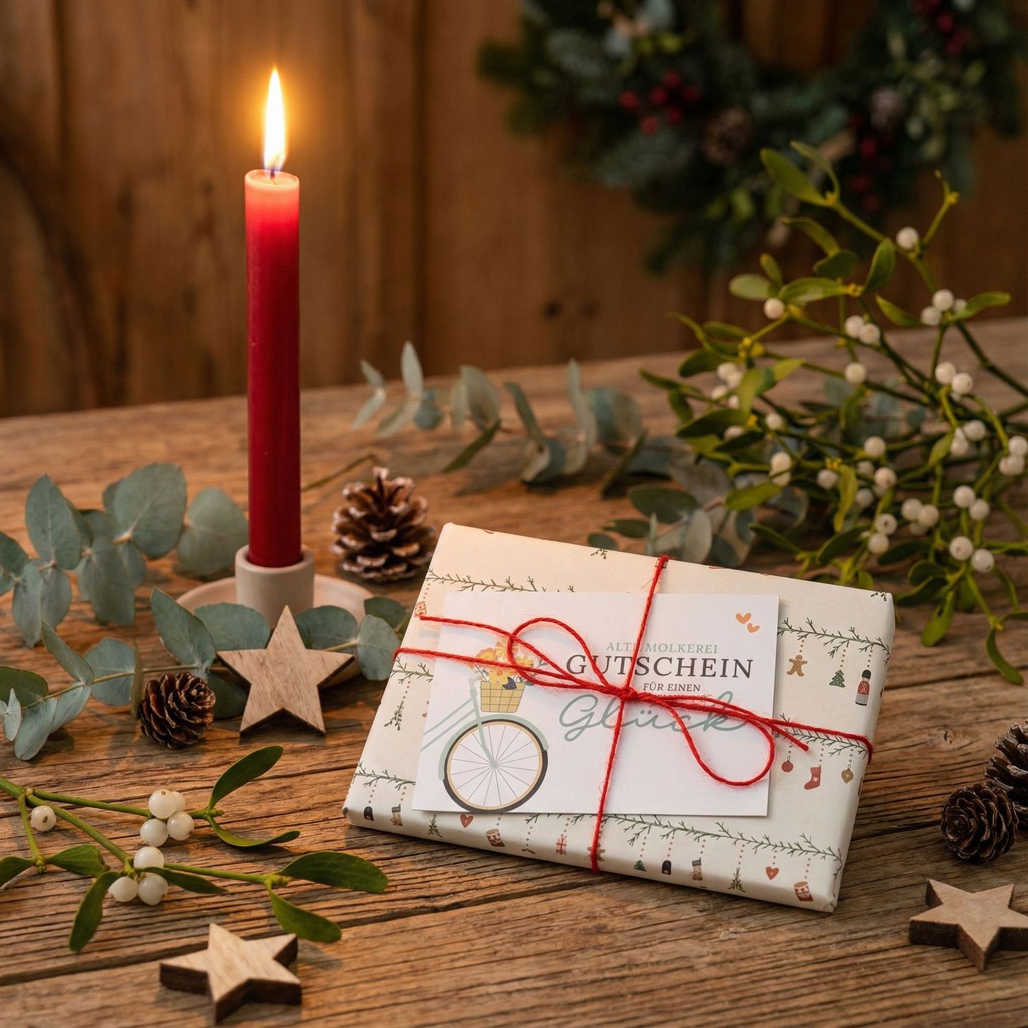 Geschenkgutschein Alte Molkerei weihnachtlich als Geschenk verpackt (10-100 Euro auswählbar)