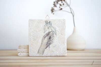 evimstore | Printed Natural Stone Tile - Hand with twig evimstore | Printed Natural Stone Tile - Hand with twig