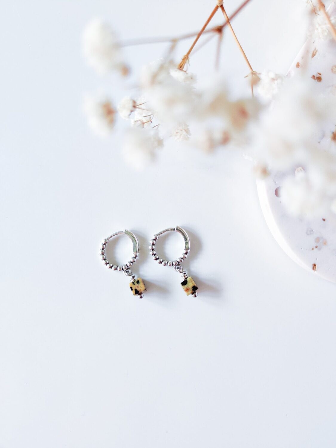 Isa & Roza | Silver dotted mini hoops with dalmatiner stone