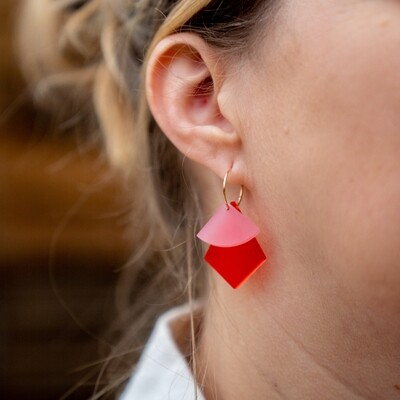 Studio Nok Nok | Gold hoops with a red and pink pendant - recycled acrylic