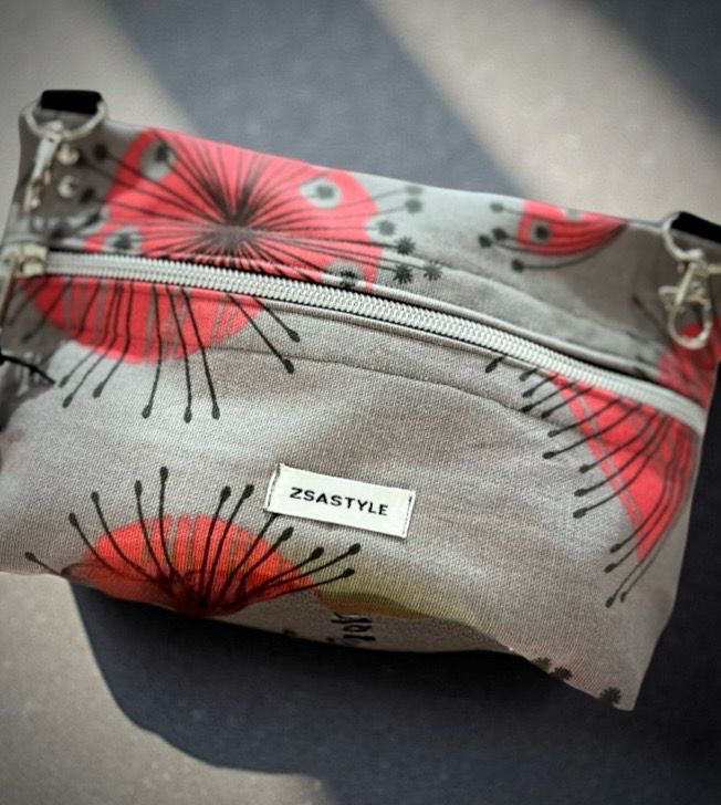 Clip on cross body/ waist clutch bag
