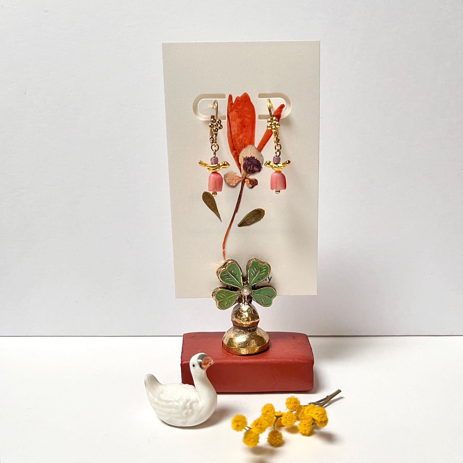 The petit bird &amp; coral flower earrings