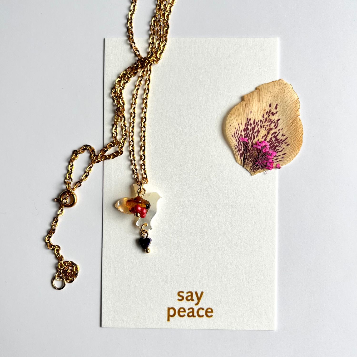 Say peace petit doves earrings