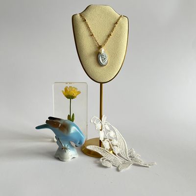 Cameo Lily of the valley baby blue necklace.