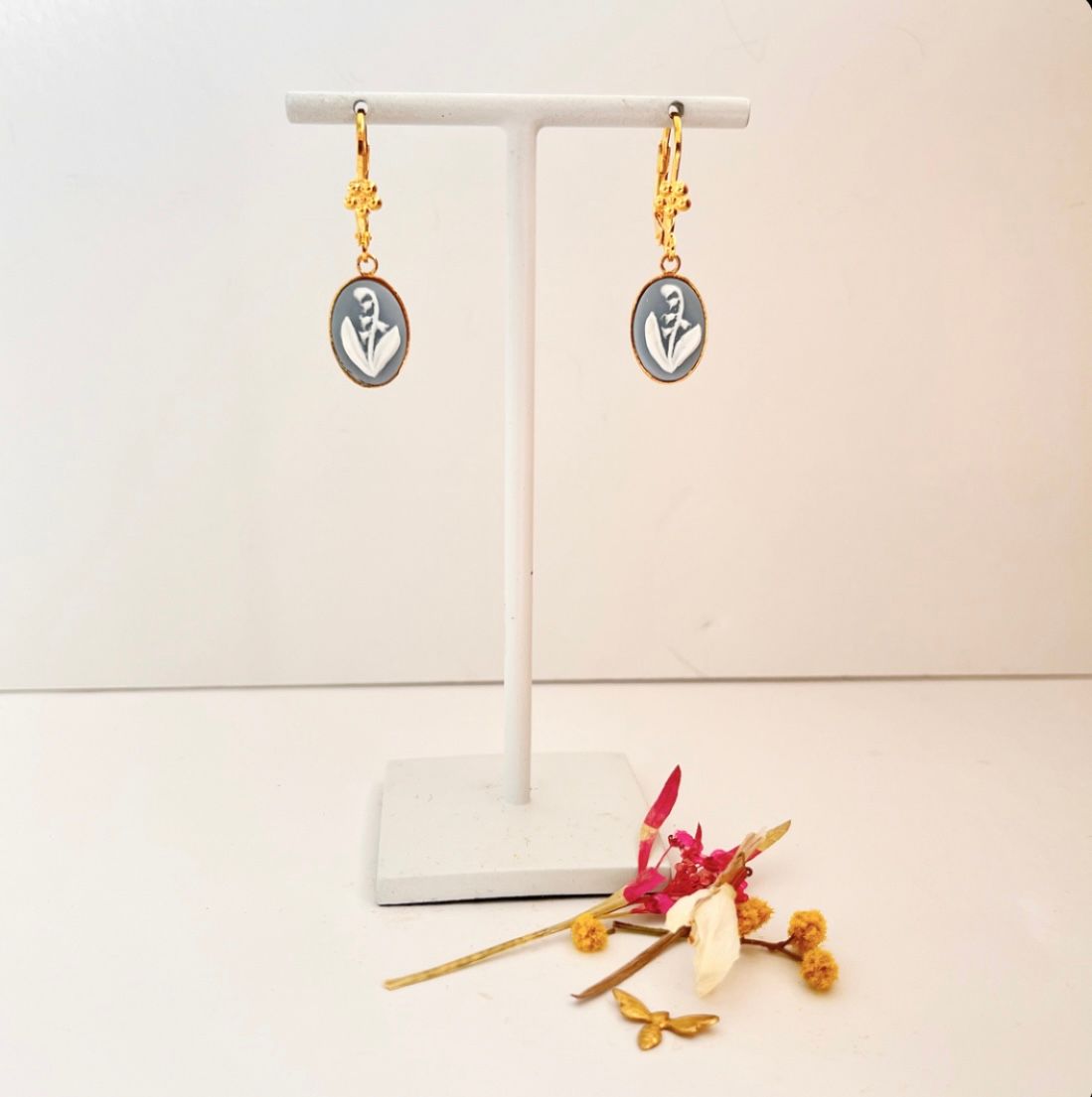 Cameo Lily of the valley baby blue necklace.