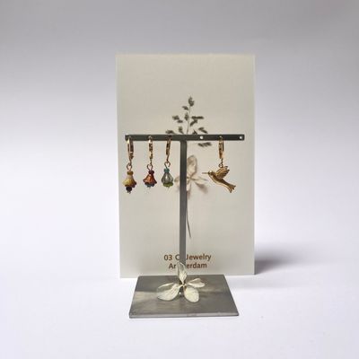 Hummingbird and flower cup earrings