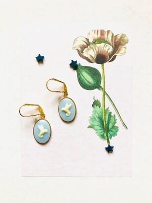 Cameo hummingbird  baby blue earrings.