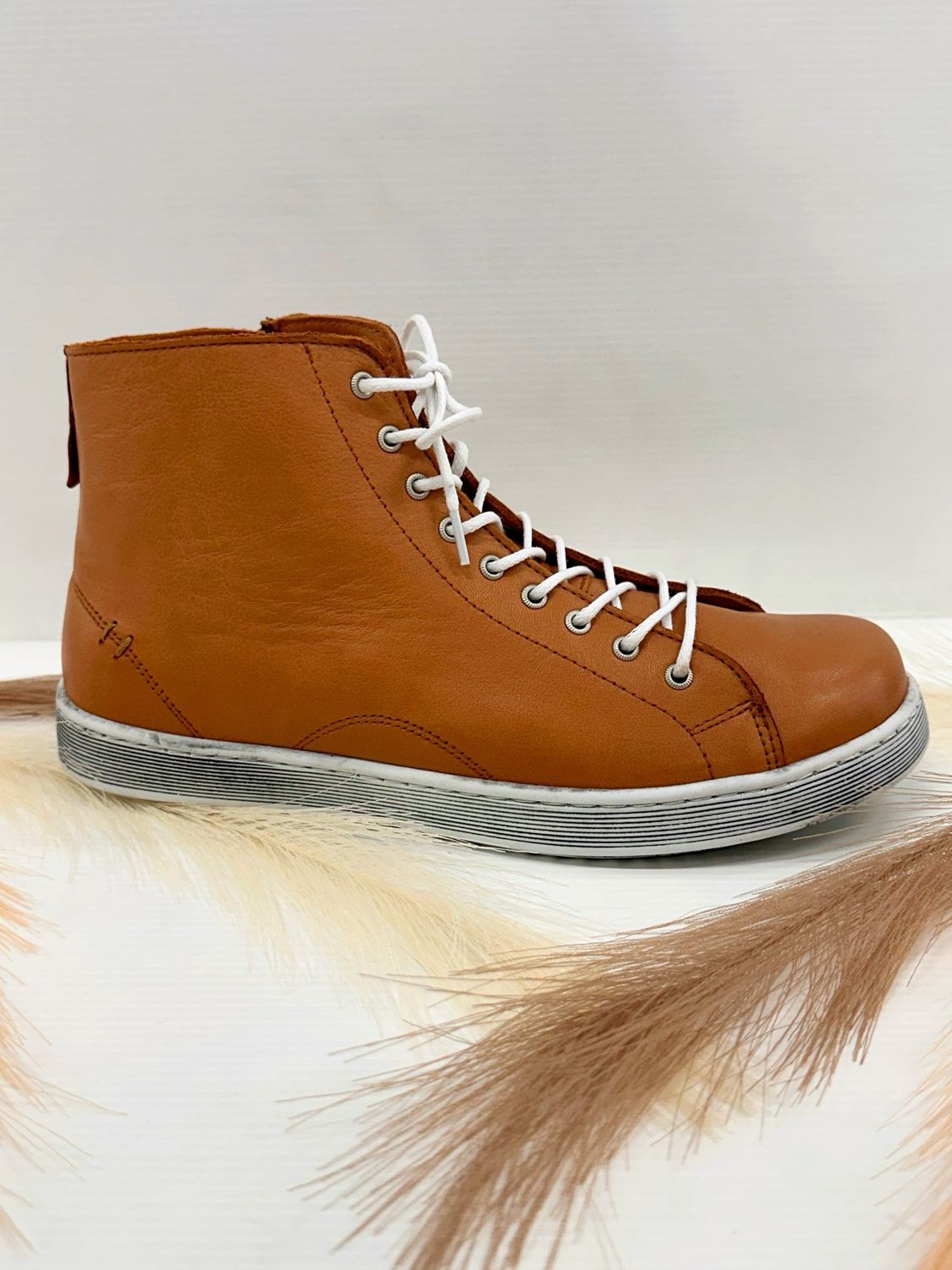 Rilassare- Typo, cognac