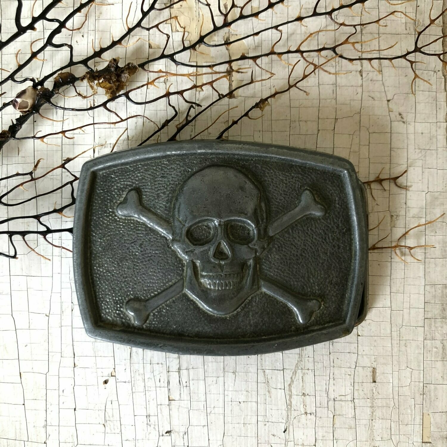 bones belt buckle