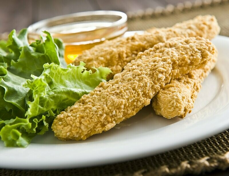 Tiras de pollo empanado