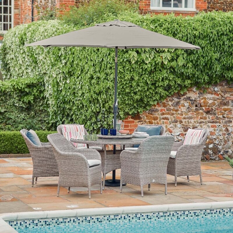 MONTE CARLO STONE SIX SEAT DINING SET WITH LAZY SUSAN AND 3 METRE PARASOL