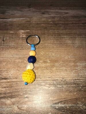 Schlüsselanhänger gelb/blau