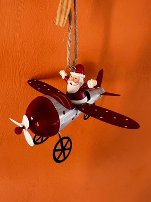 Babbo Natale su Aereoplano Rosso e Bianco in Latta 3D