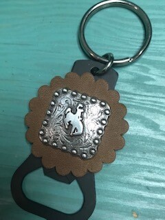 Keychain with Wyoming steamboat concho on tan leather