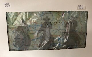 Cutting board/rectangle/cowboys on Wyo. map