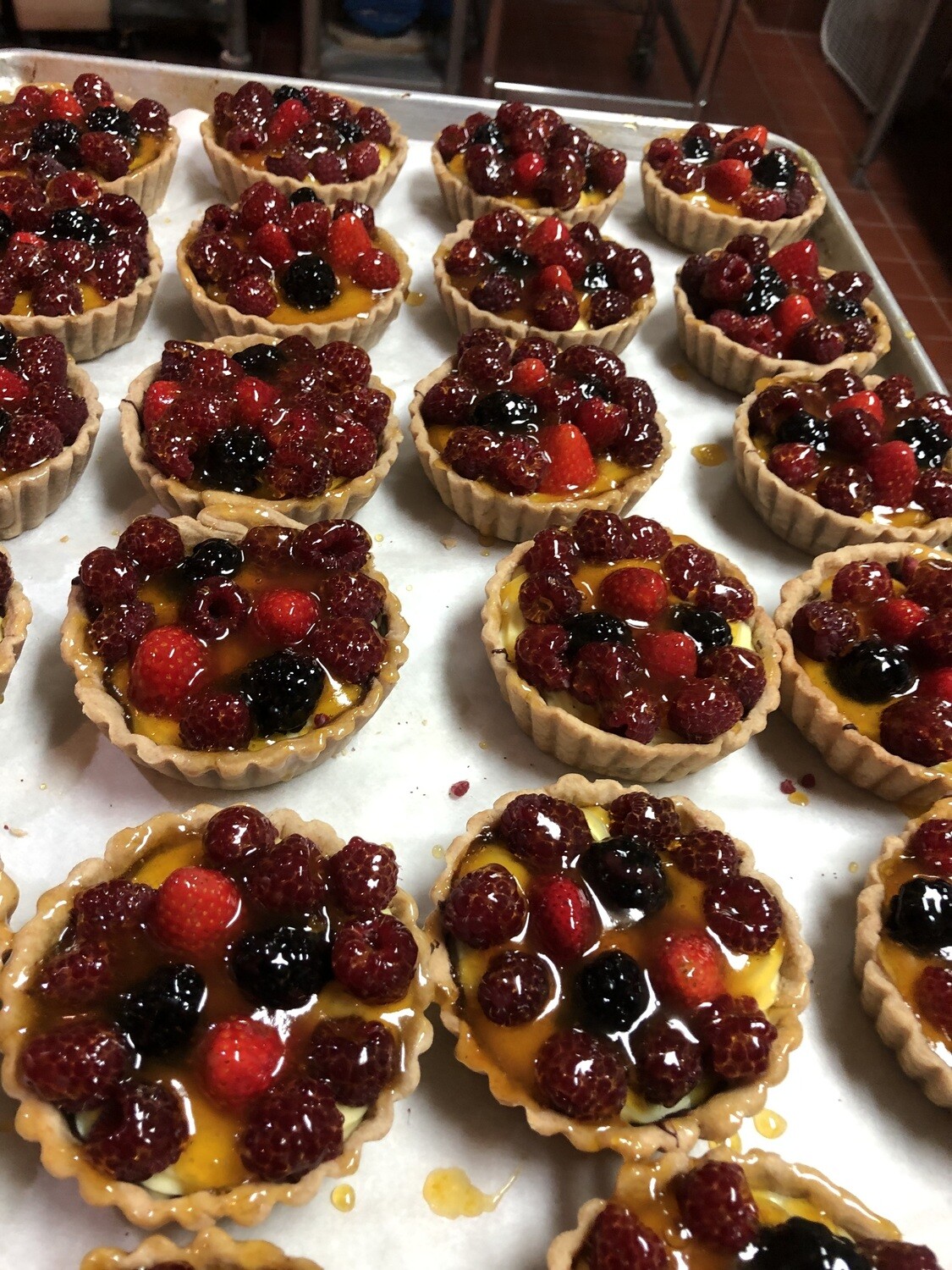 Mixed Berry Tart with Pastry Cream Chocolate lined shell (4") Mixed Berry Tart with Pastry Cream Chocolate lined shell (4")