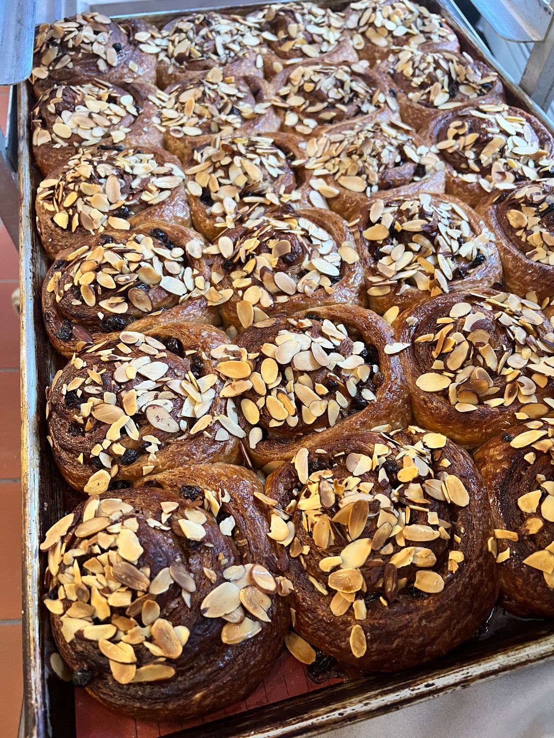 Chocolate Chip, Sliced Almond, Rose Pastry Cream rolls. Chocolate Chip, Sliced Almond, Rose Pastry Cream rolls.