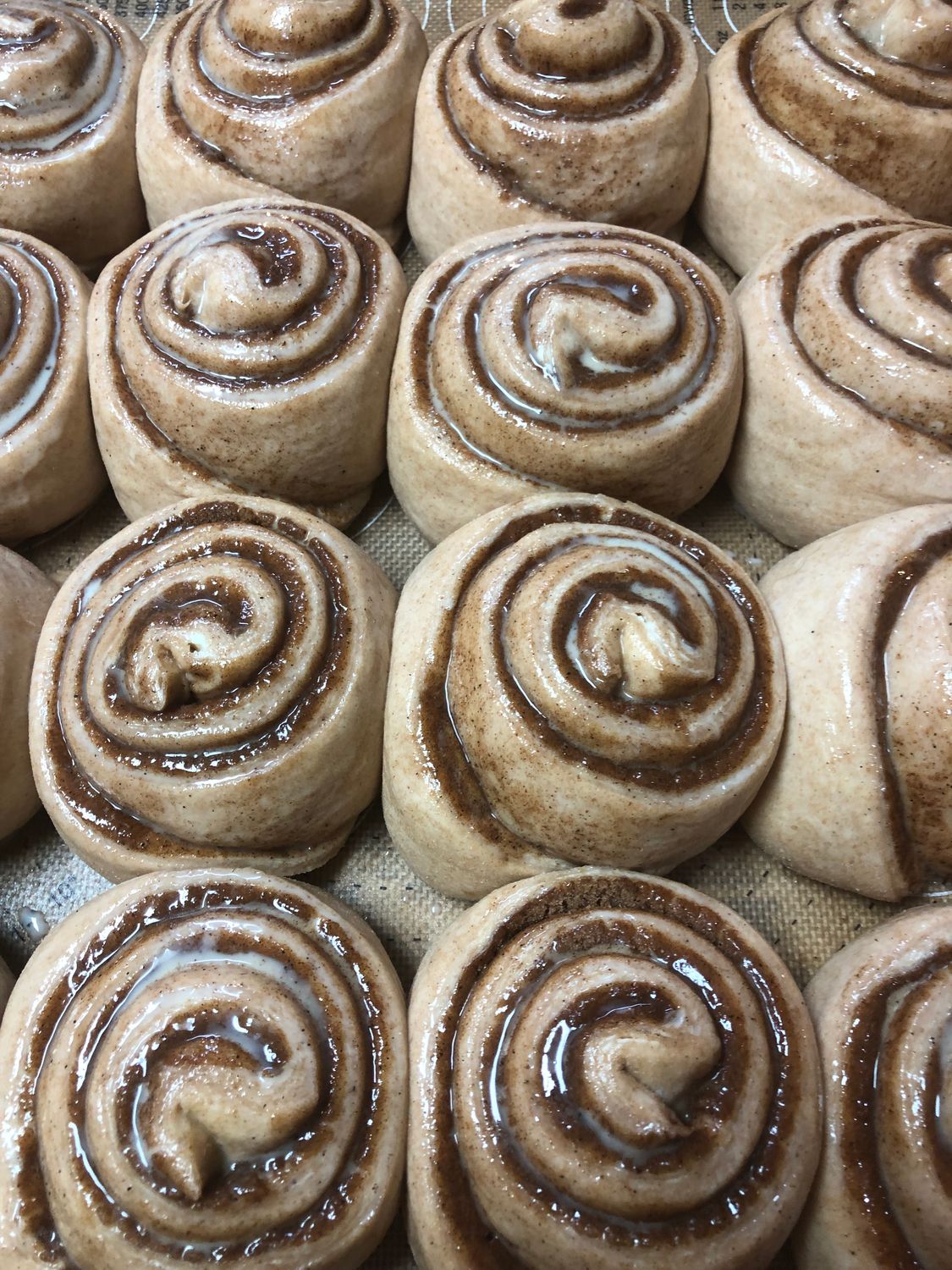 Cinnamon Raisin Roll with sliced Almonds