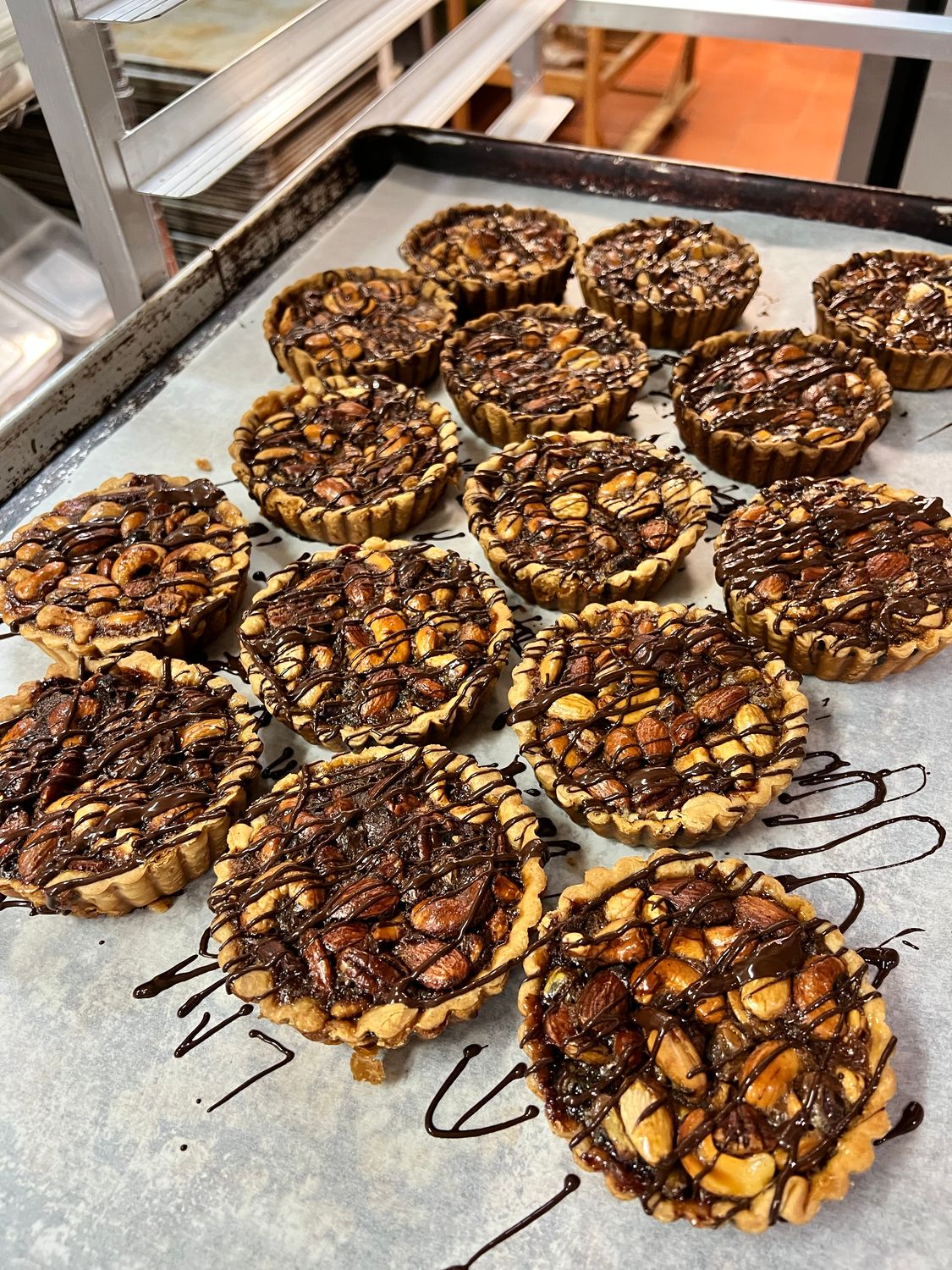 Mixed Nuts Bourbon Tart with 64% Guittard Chocolate inside and out  (5in)