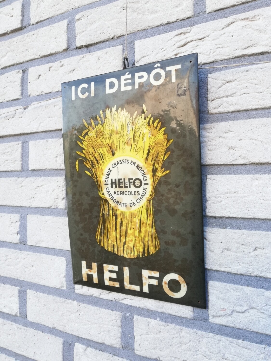 Oud reclamebordje Helfo