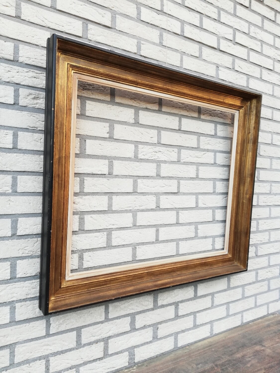 Grote vergulde houten kader