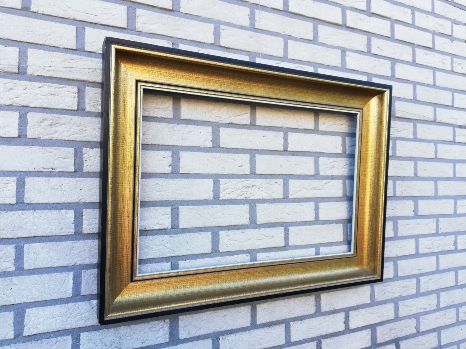 Grote vergulde houten kader
