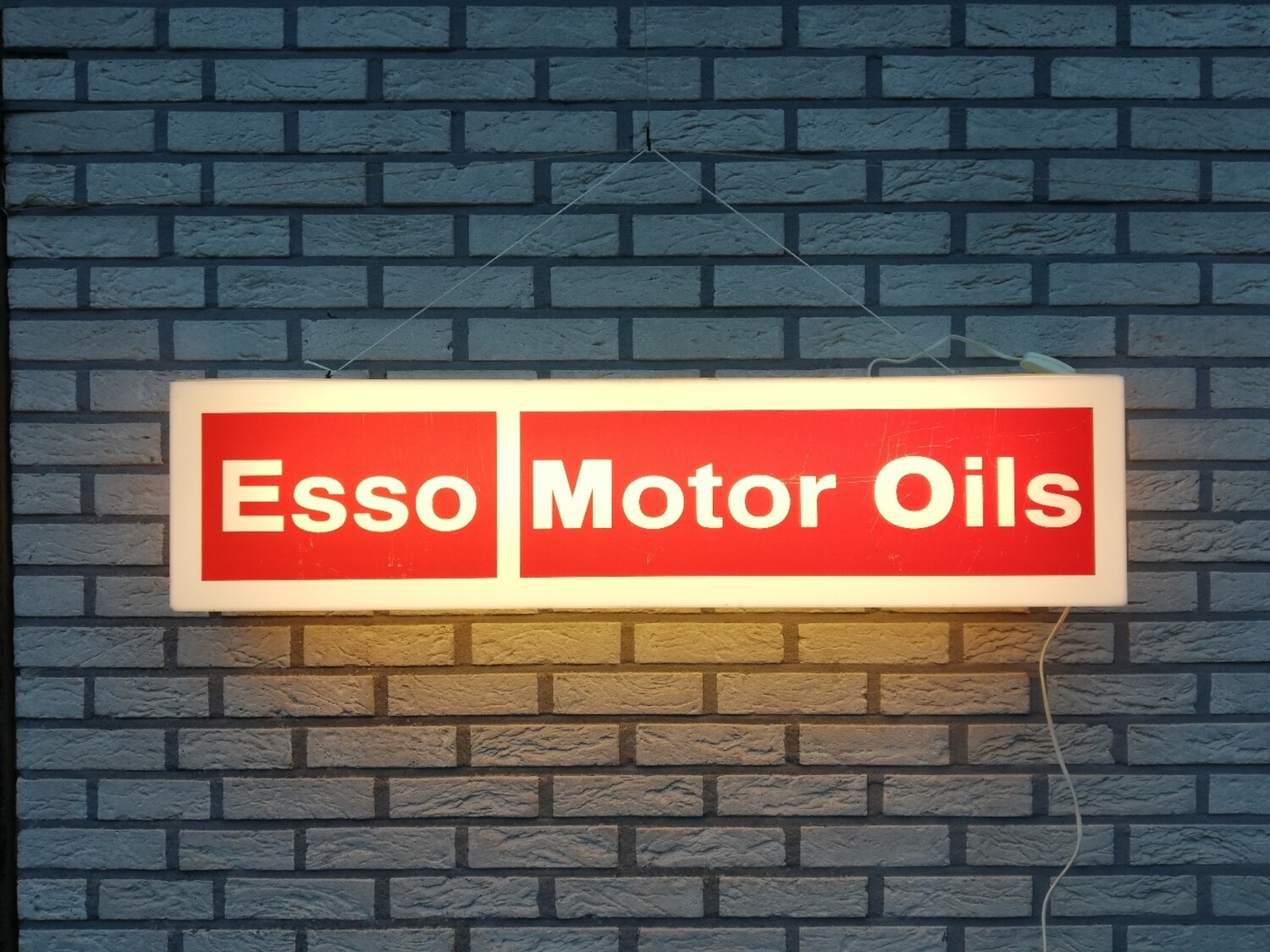 Lichtreclame Esso Motor Oils