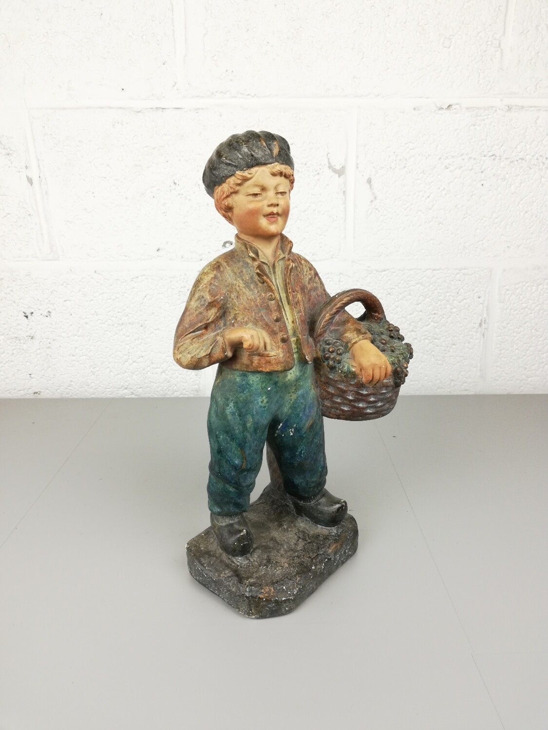 Plaster sculpture of a boy