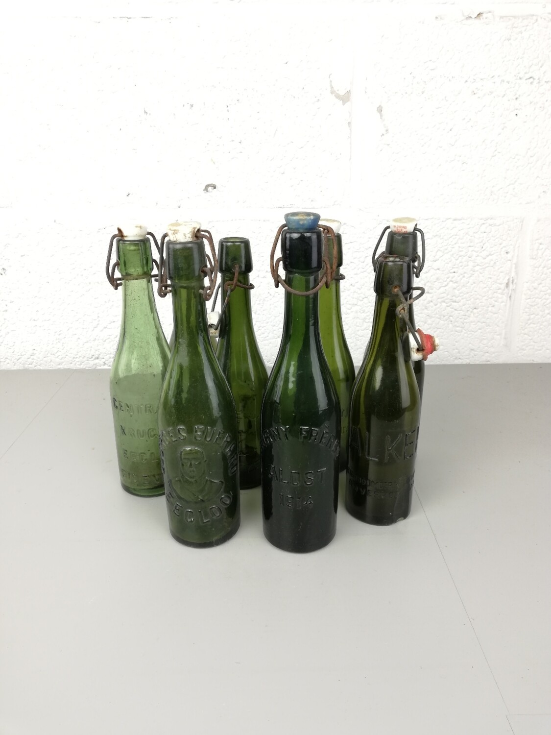 8 antique beer bottles