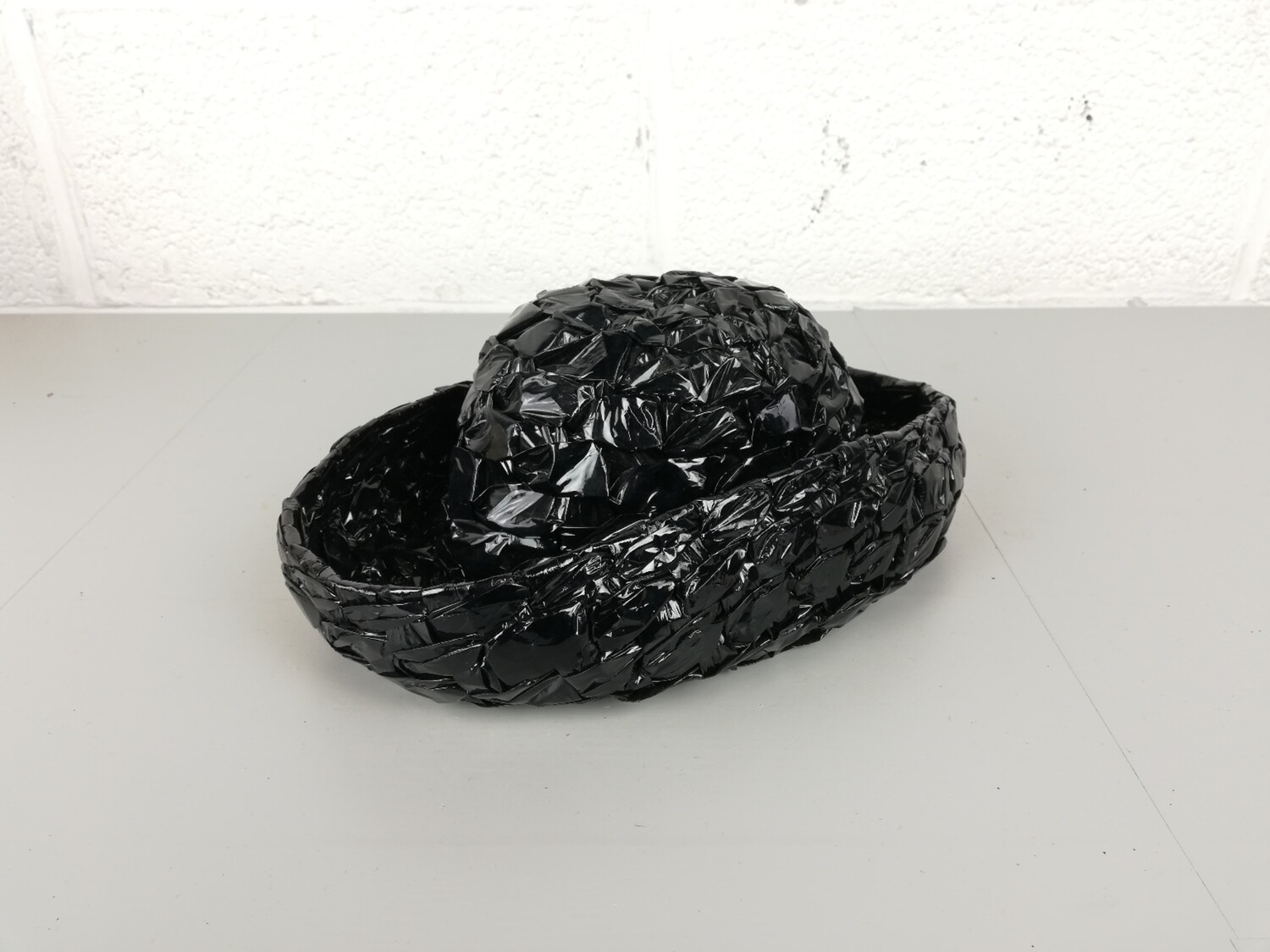 Braided plastic hat