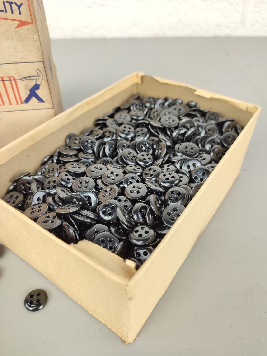 Box of Permaloid buttons