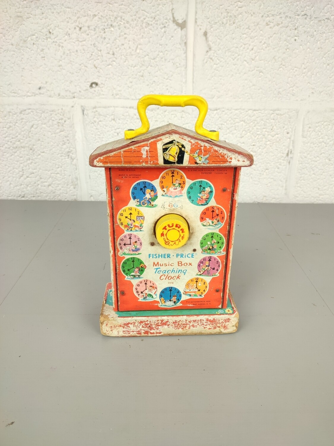 Fisher price teaching clock 1962