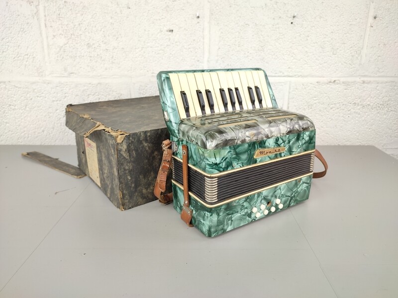 Vintage Monika children's accordion