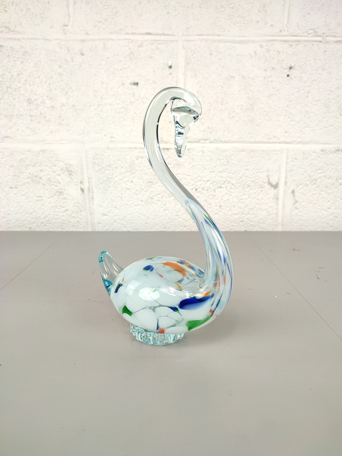 Large glass sculpture of a swan