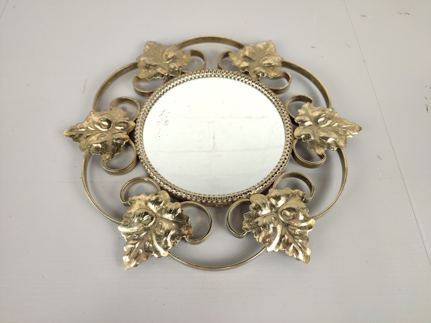 Vintage brass sun mirror