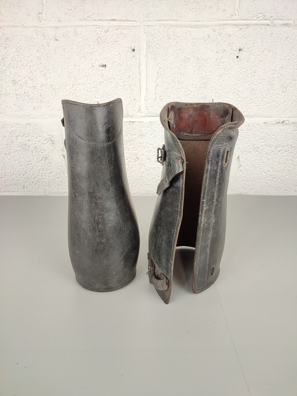 Black leather shin guards