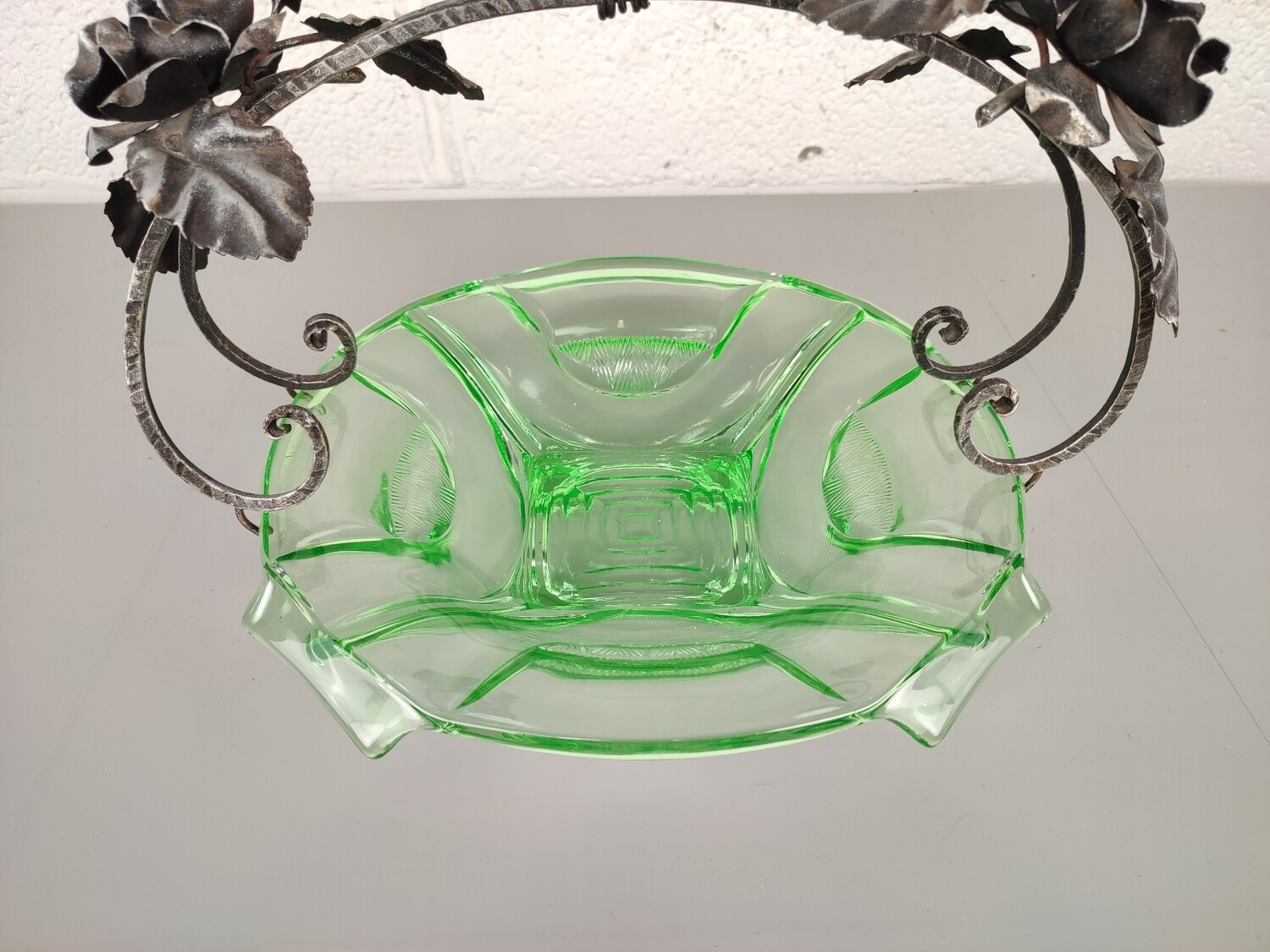 Glass bowl with wrought iron handle