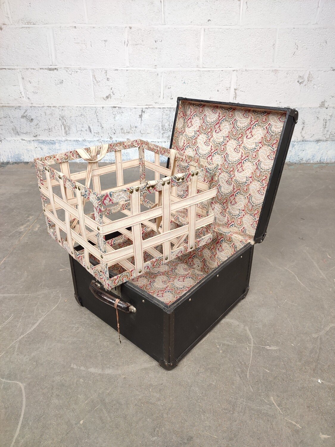 Old suitcase with basket