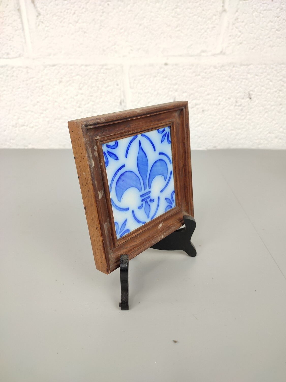 Antique tile in frame