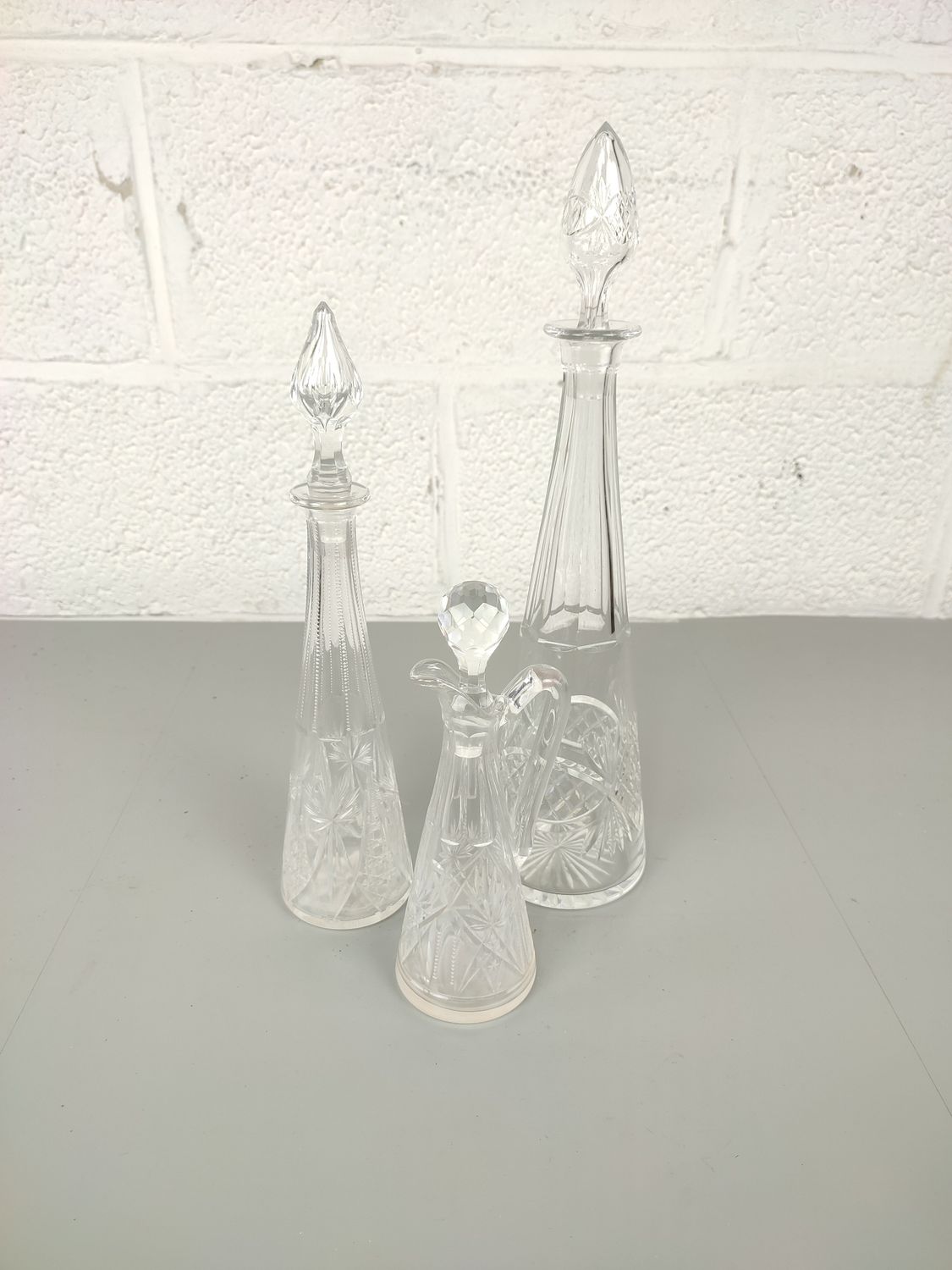 set of 3 crystal decanters