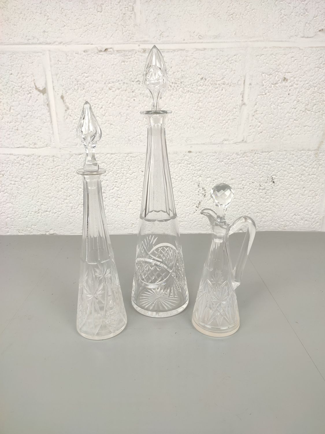 set of 3 crystal decanters