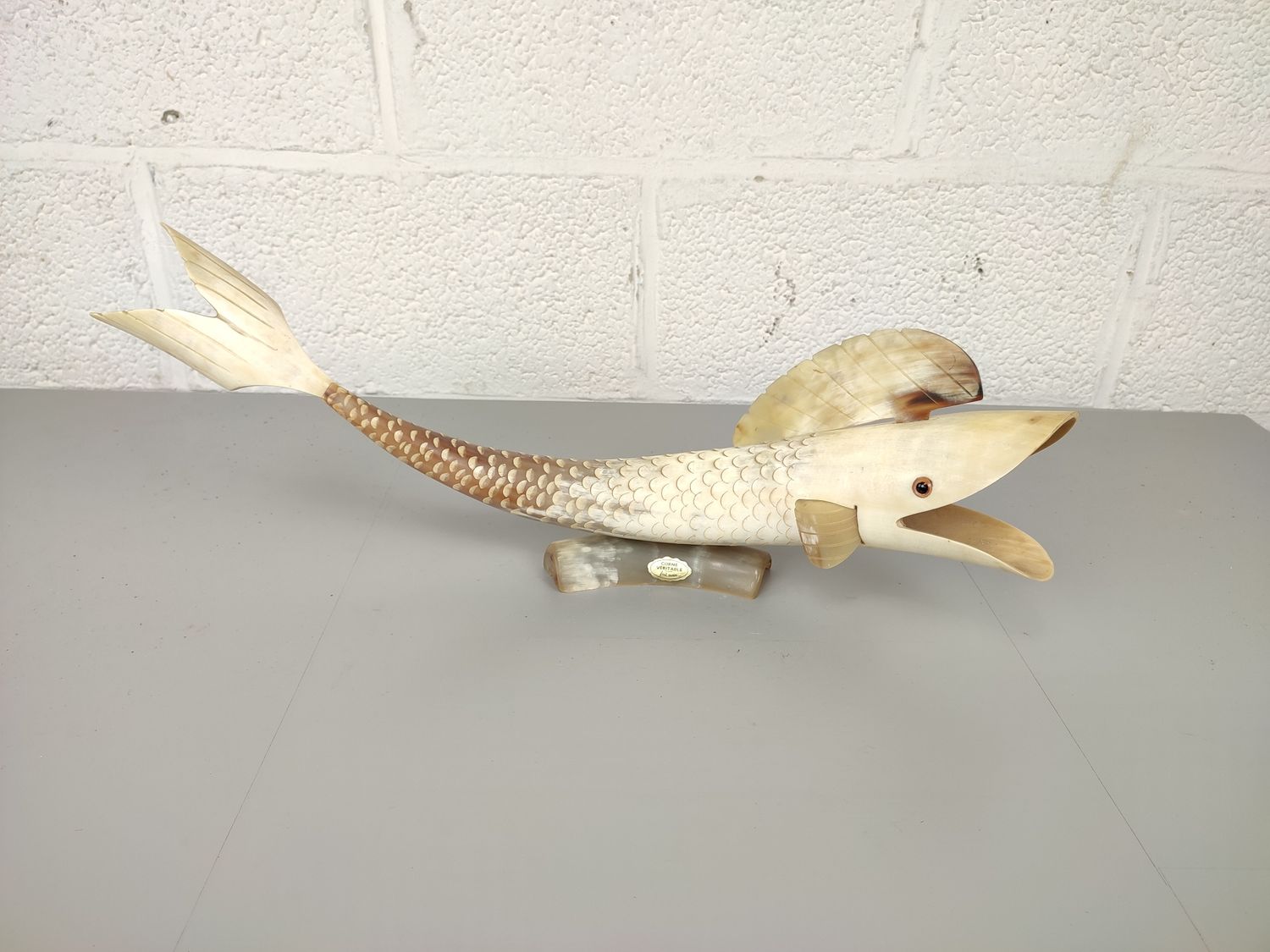 Big fish in horn