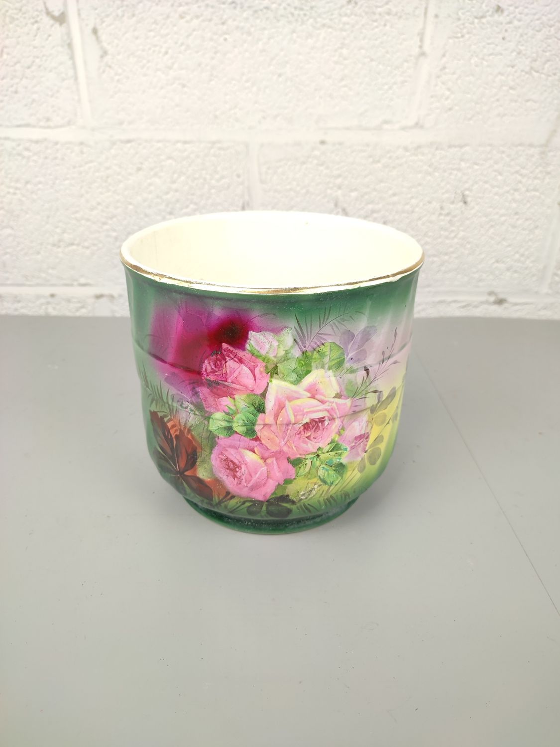 Vintage flowerpot with flower decor