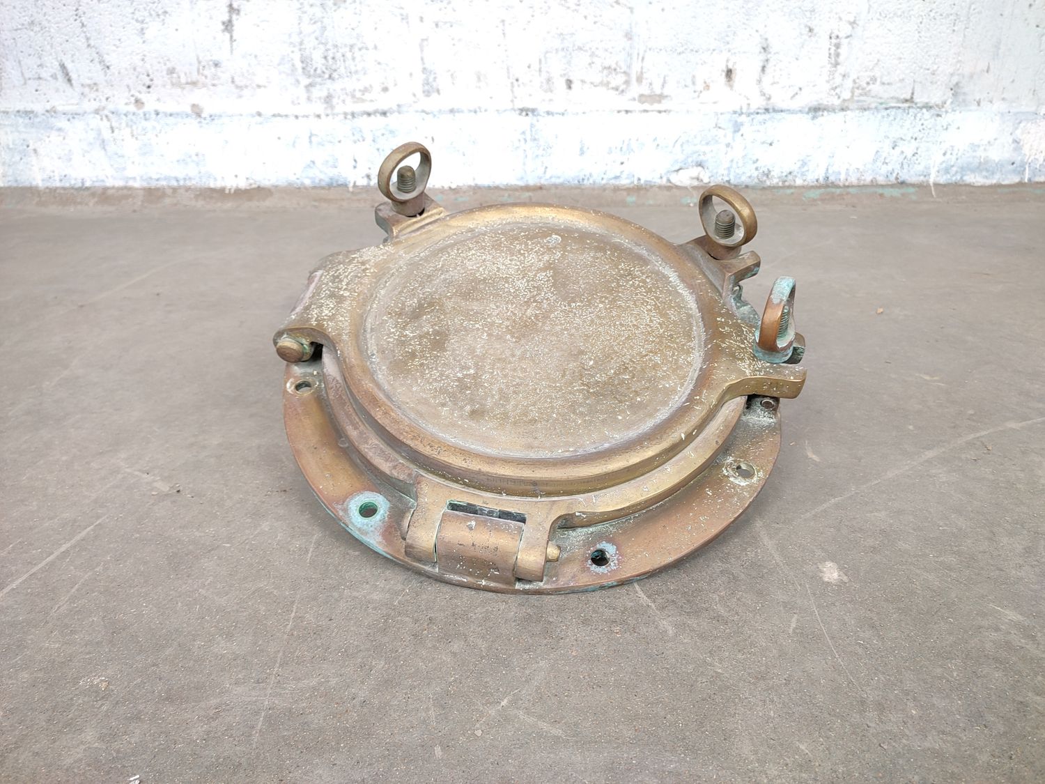 Antique brass ship&#39;s porthole