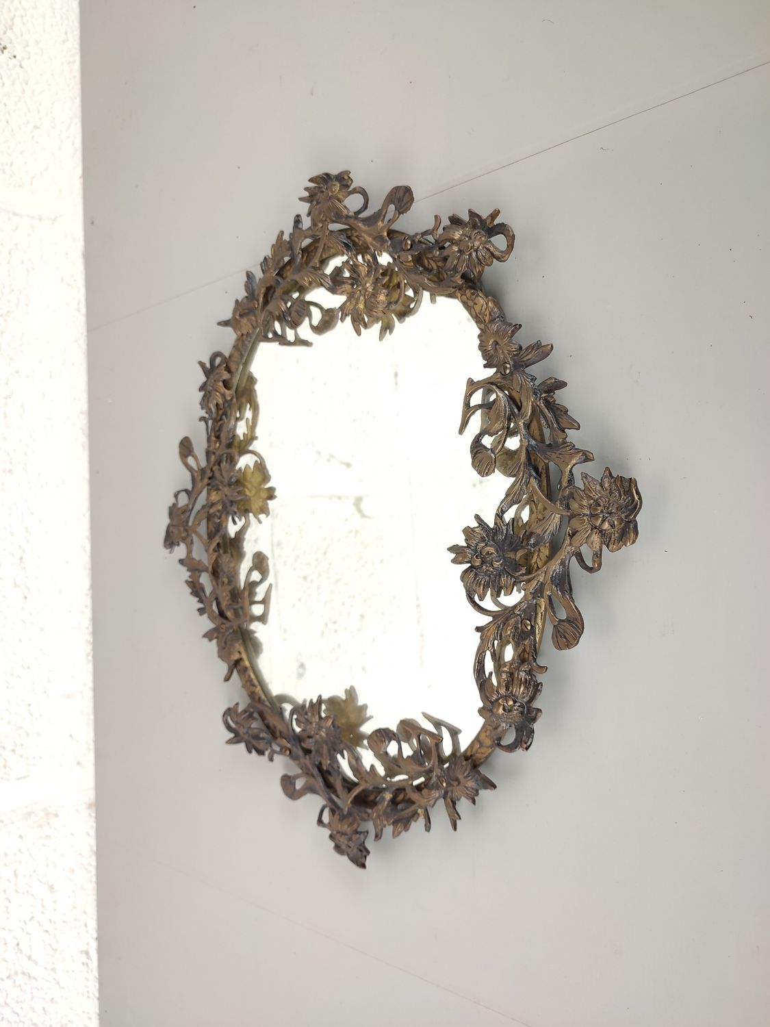 Floral brass mirror