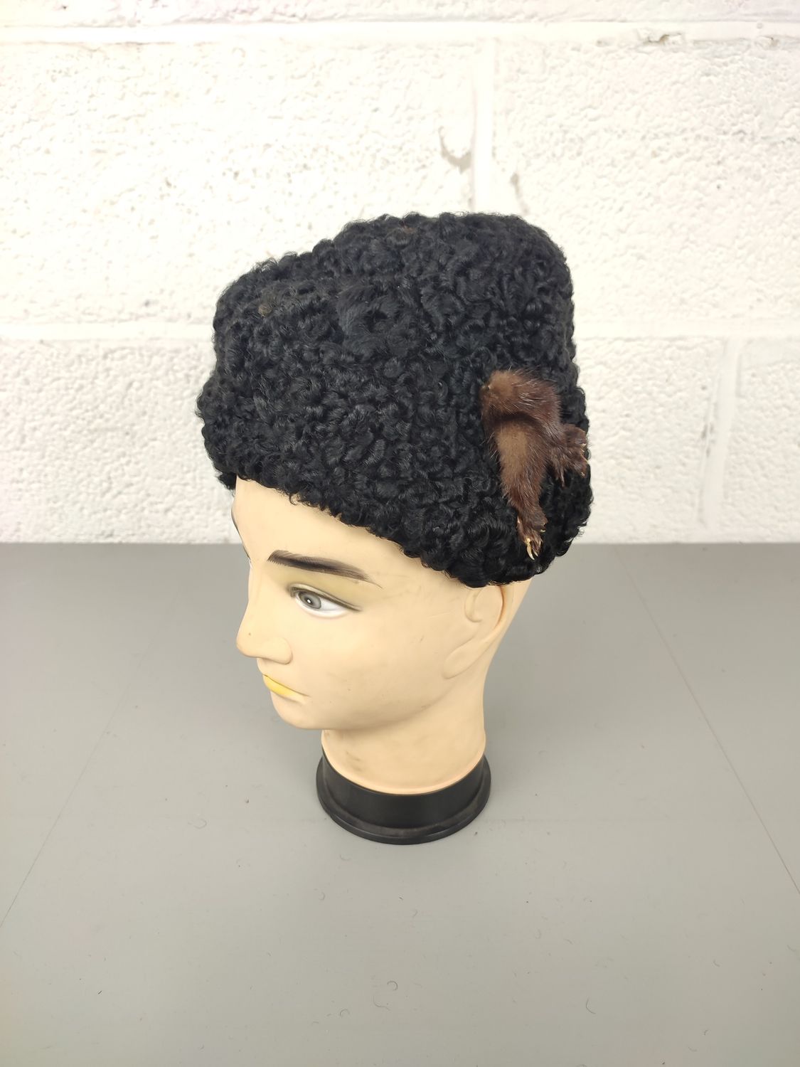 Black hat with mink legs