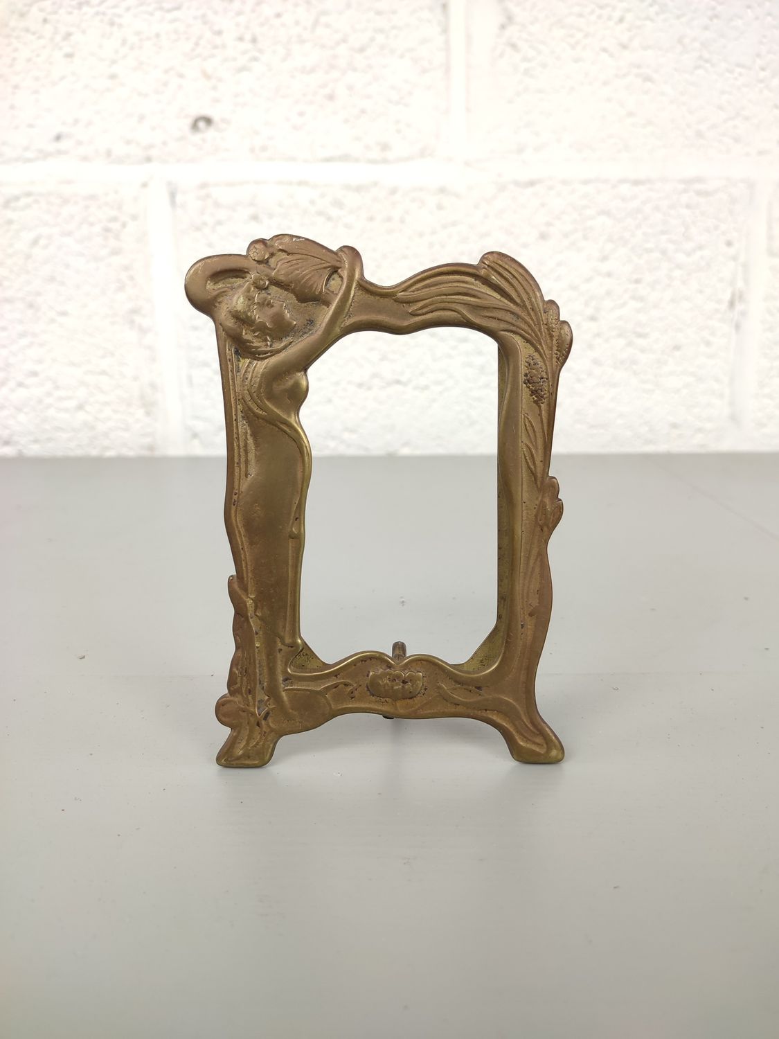 Brass art nouveau photo frame in art nouveau style