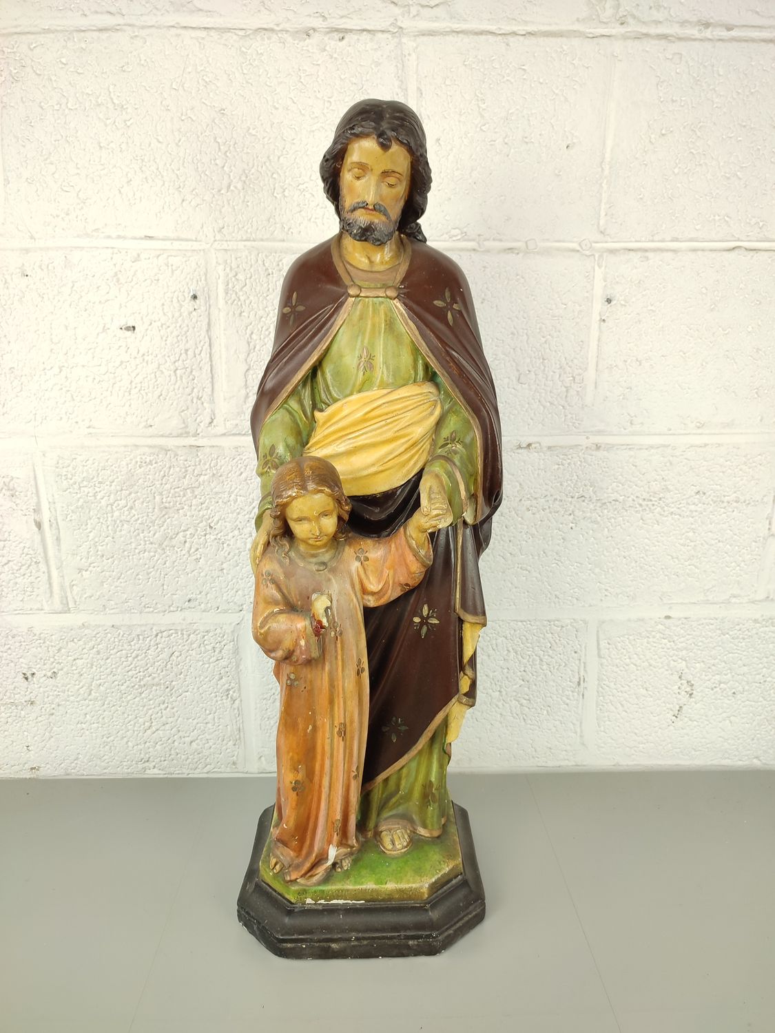 Large plaster statue of Joseph and child