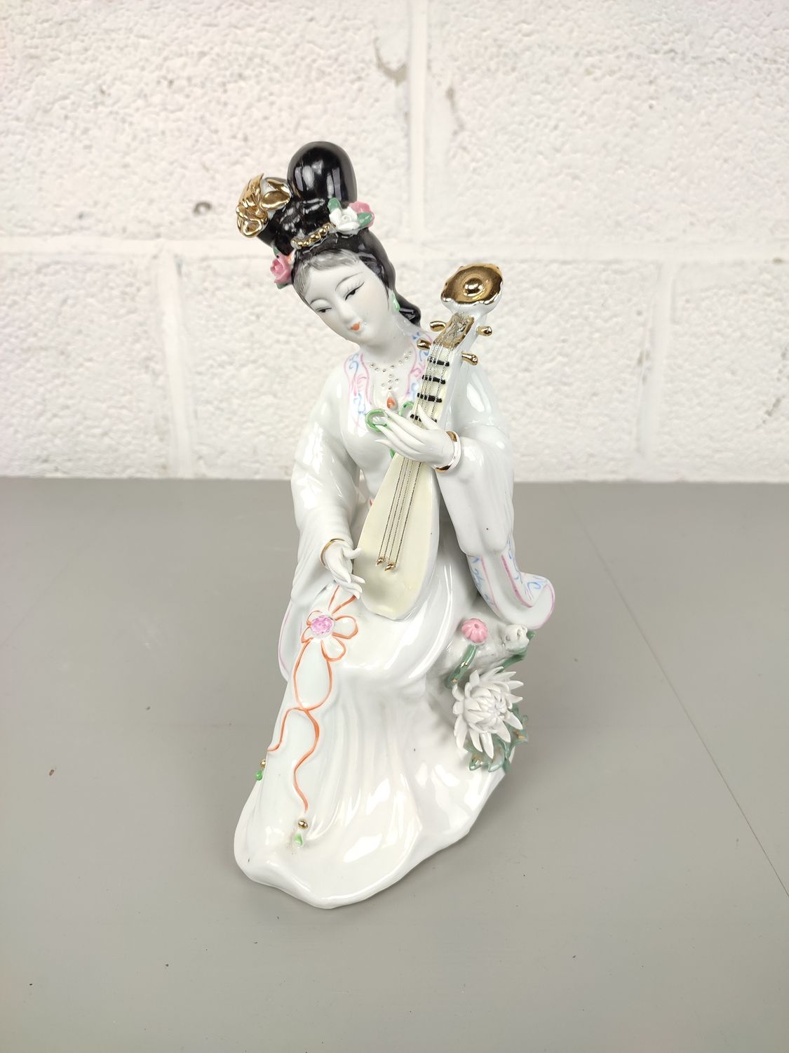 Porcelain bsculpture of a Geisha